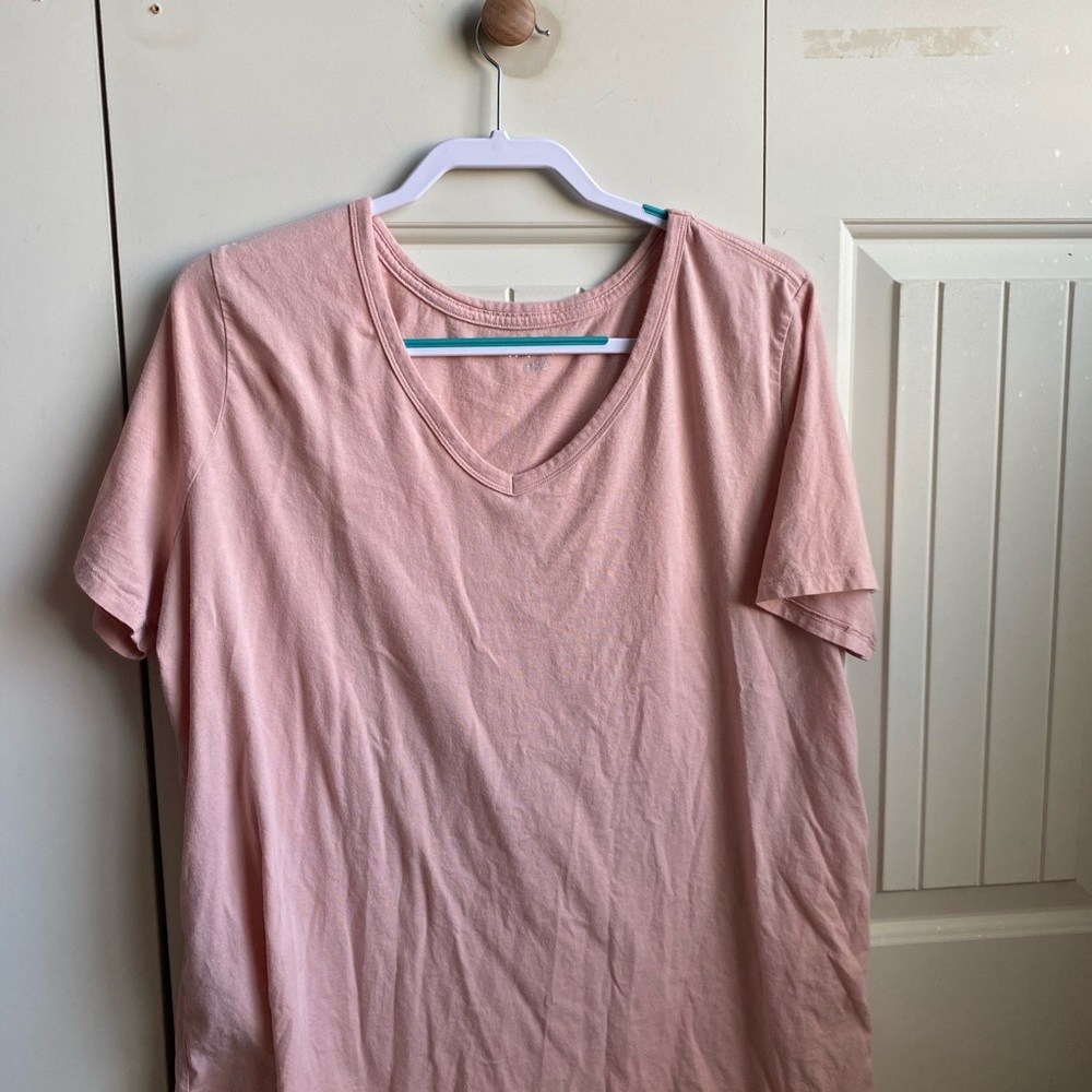 I’m selling this light pink shirt from Ava & Viv